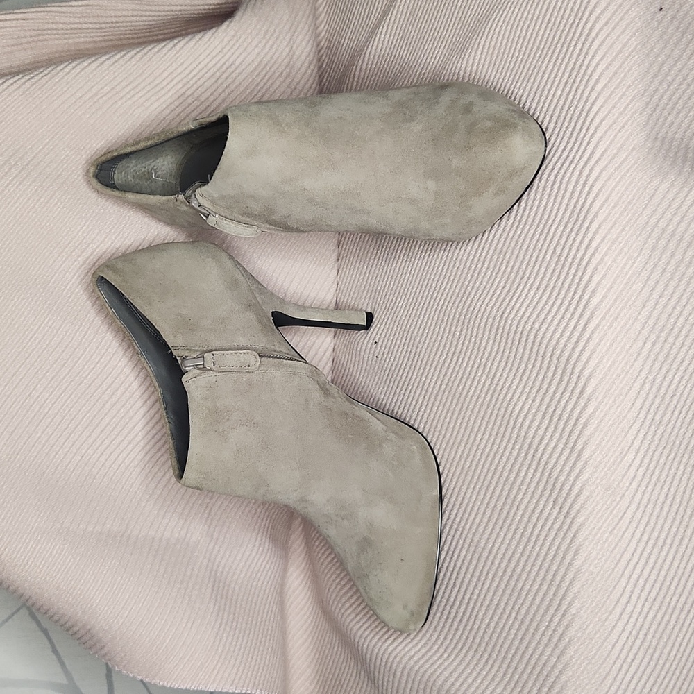Brand new, size 9.5 wedge booties